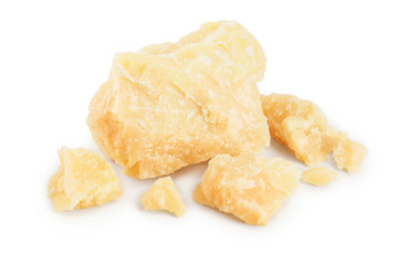 Parmesan cheese pieces isolated on white background. Closeup