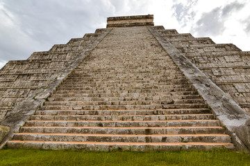 Fototapeta na wymiar Temple of Kukulkan - a Mesoamerican step-pyramid that is the main tourist attraction at the Chichen Itza archaeological site in Yucatan, Mexico.