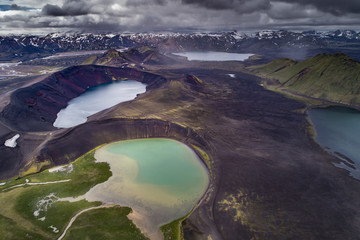 Iceland - Landmannalaugar - Aerial panorama view of volcano crater lakes and lava fields in Volcano area Ljótipollur
