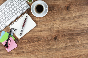 Items for business on a light background on the table, view from the top