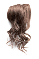 Naklejka premium Long wavy brown hair on white background
