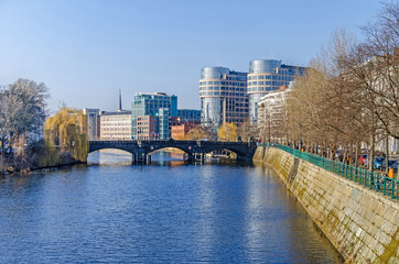 River Spree embankment Helgolaender Ufer with the Moabiter bridge, Spree-Bogen and the Ameron Hotel...