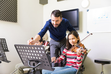 Student Learning Violin From Scratch