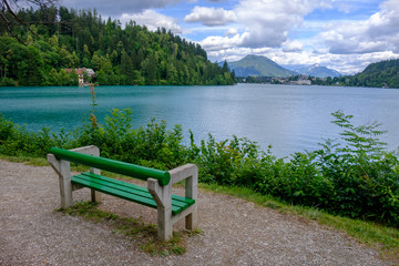 Naklejka na ściany i meble Beautiful lake with bench.