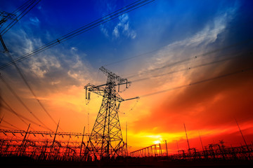 Fototapeta premium Electric tower, silhouette at sunset