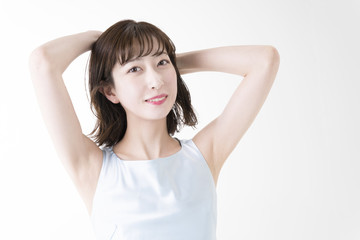 Fototapeta premium 女性 カメラ目線 夏服 脱毛