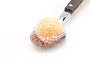 coconut kiss (beijinho de coco) - typical sweet Brazilian cuisine isolated on white background