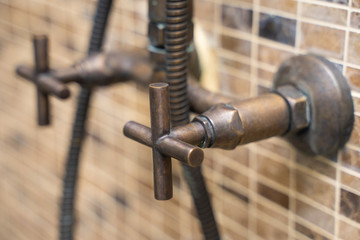 metal faucet for turn on in bathroom