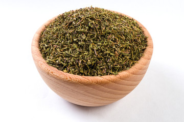 Fototapeta na wymiar thyme herb in wooden bowl isolated on white background.