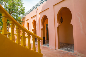 Beautiful morocco building architecture style. Staircase and hallway corridor with lamp in colorful...