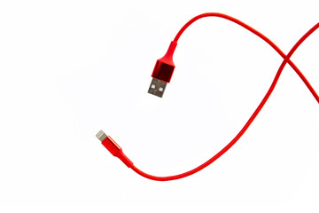 Red USB cable for smartphone isolated on white background, File contains with clipping path.