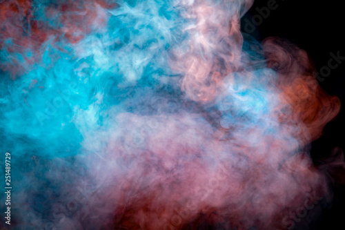 Background Of Orange Purple Red And Blue Wavy Smoke On A Black