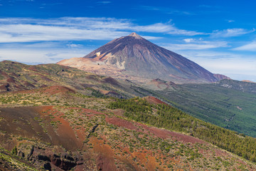 Great view of the Teide volcano with a flying paraglider. Las Cañadas del Teide. Tenerife. Canary Islands..Spain