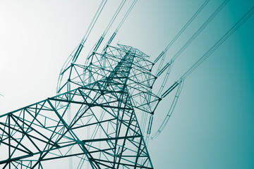 Abstract pattern from bottom view of high voltage pole power transmission tower with clear sky...