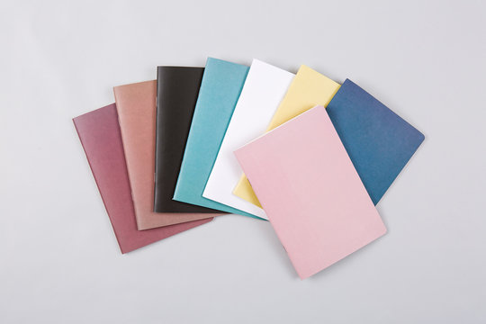 notebooks of various colors colorful notes.