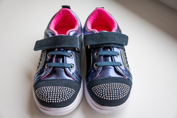 Baby boots, luxury sneakers, sports shoes, boots for girls. Kids trendy footwear with rhinestone...