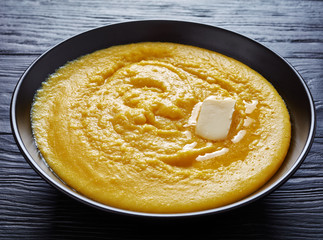 hot polenta with melting butter in a bowl
