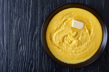 hot polenta with melting butter in a bowl
