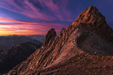 Naklejka premium Illuminated rock cliff