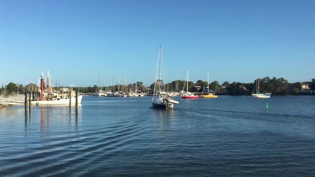 Yachts and fishing boats at Yamba marina a popular resort town in New South Wales Australia.