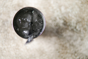 Close Up of Ice water with blurred background and copyspace.