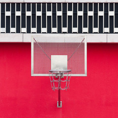 Basketball hoop on a red background