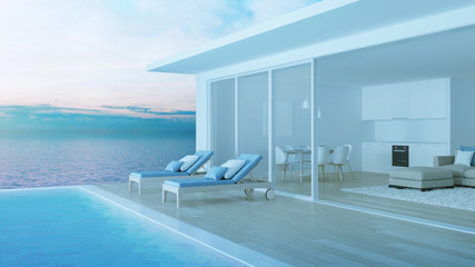 Fototapeta na wymiar Interior of a villa with a swimming pool. House overlooking the sea. Night. Evening lighting. 3D rendering.
