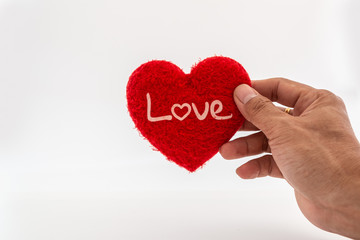 Hand holding a heart shape on a white background,Concept love