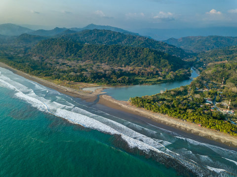 Beautiful aerial view of the Beach in Dominical  and the Baru River in Costa Rica