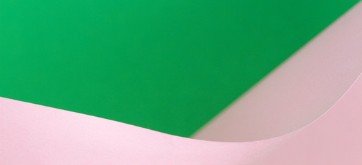 Abstract geometric shape pink and green color paper background