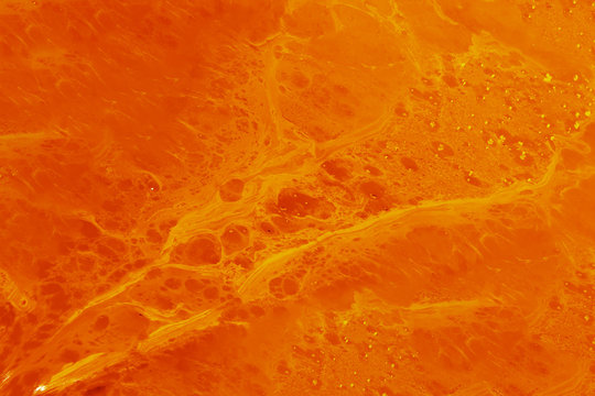 Metal on casting. Red hot magma texture pattern, red glowing liquid of melt steel iron. abstract background and texture.