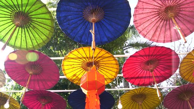 Paper umbrellas multicolored Colorful lamps decorated at Wat Si Mongkol Wat Kong, Thai temple which is famous tourist attraction Lanna style in Nan Province Thailand