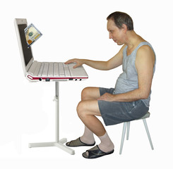 The man is earning money on his computer. One hundred dollar bill drops from laptop screen. White background.