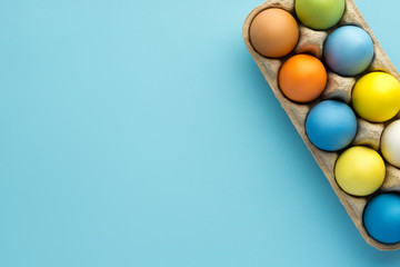 Painted easter eggs on blue background