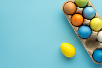 Painted easter eggs on blue background