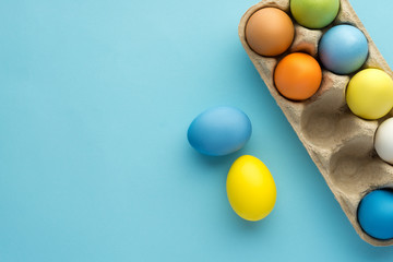 Painted easter eggs on blue background