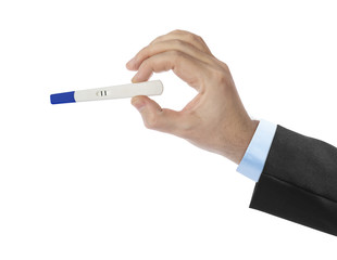 Hand with pregnancy test