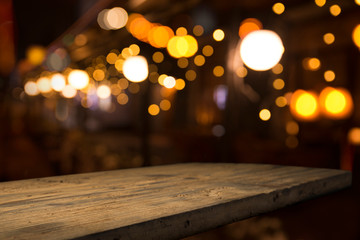 Beer barrel with beer glasses on a wooden table. The dark brown background.