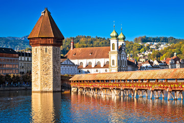 Kapellbrucke historic wooden bridge in Luzern and waterfront landmarks view