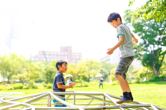  Brothers playing in the park