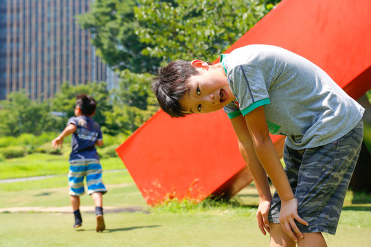 A boy playing in the park