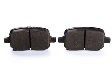 Set of brake pads, car spares isolated on white background