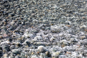 Stone seashore as abstract background