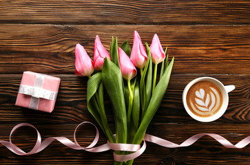 Tender minimalistic spring flowers composition on texture surface. Beautiful feminine plant decoration for holiday greeting card. Summertime, summer, spring, march april, june july. Happy mother's day