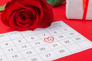 February 14 on calendar and decorations for Valentine's Day.