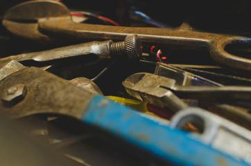 Fototapeta premium A close up view of the big old pile of the vintage craft style tools in the shop. 