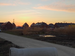 Fototapeta premium Sunset over the ring canal along the Bermweg in Nieuwerkerk aan den IJssel in the Netherlands
