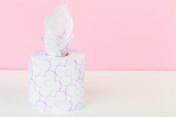 Roll of toilet paper or tissue  on color background