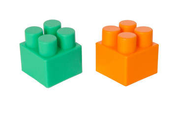 details of a children's plastic constructor on a white background. colored cubes. block.