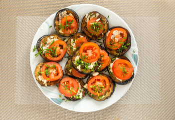 kitchen diet eggplants with tomatoes and garlic, mayonnaise and fresh onions